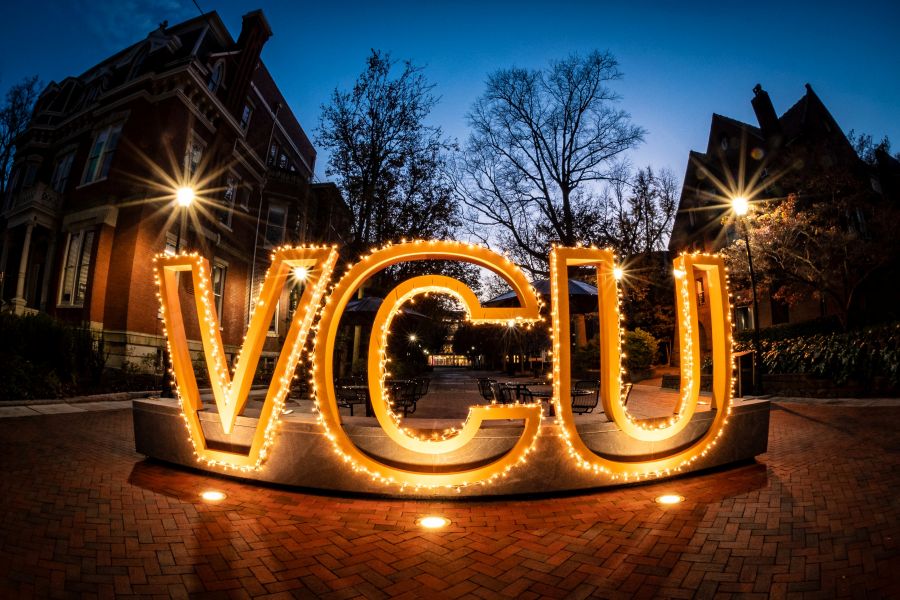 VCU logo illuminated at night